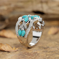 Zilveren statement ring met turquoise en kristal
