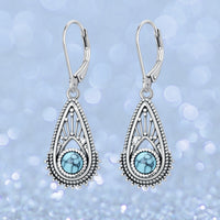 Zilveren vintage filigraan oorbellen met turquoise druppel