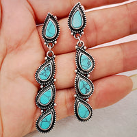 Zilveren vintage oorbellen met turquoise druppels