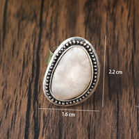 Zilveren ring met grote lichtblauwe ovale steen