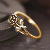 Zilveren ring met roos en bladranken