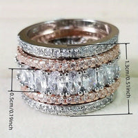Brede tweekleurige eternityring met ovale zirkonia