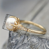 Gouden ring met parel en zirkonia accenten