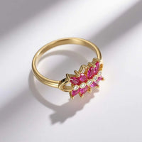 Gouden ring met twee roze zirkonia bloemen