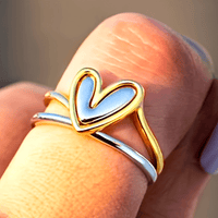 Tweekleurige gouden en zilveren ring met hart