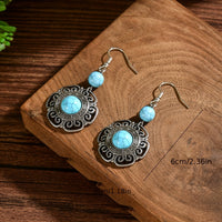 Zilveren bohemian oorbellen met filigraan en turquoise