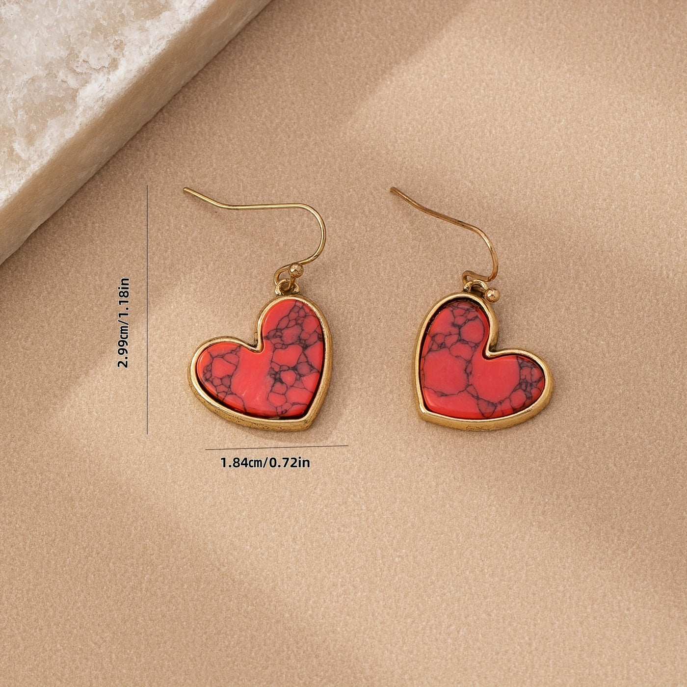 Gouden oorbellen met turquoise hart