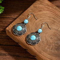 Zilveren bohemian oorbellen met filigraan en turquoise
