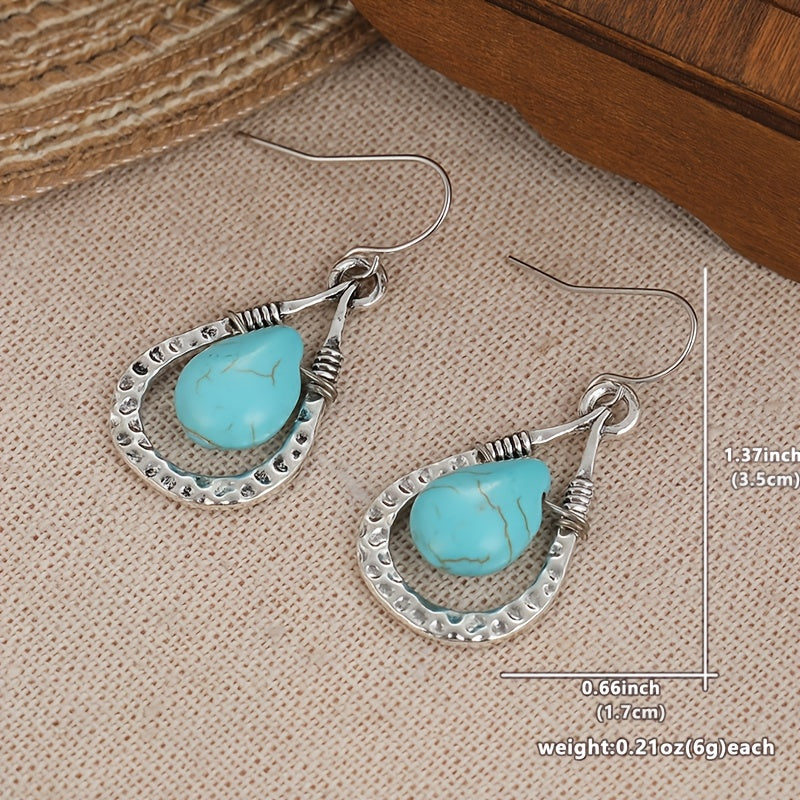 Zilveren oorbellen met wire-wrapped turquoise druppel