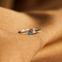 Gouden ring met kleurrijke geboortestenen