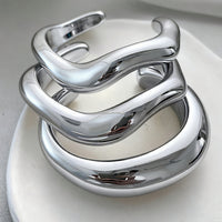 Zilveren chunky golvende bangle-armbandenset