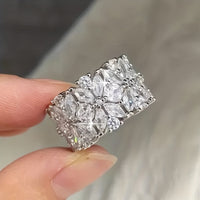 Zilveren brede ring met marquise zirkonia bloemtros