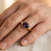 Gouden ring met paarse ovale amethist