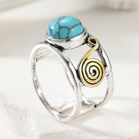 Tweekleurige bohemian ring met ronde turkooizen steen