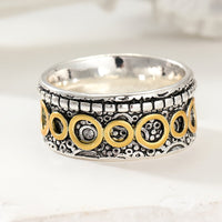 Zilveren vintage ring met gouden cirkelmotief