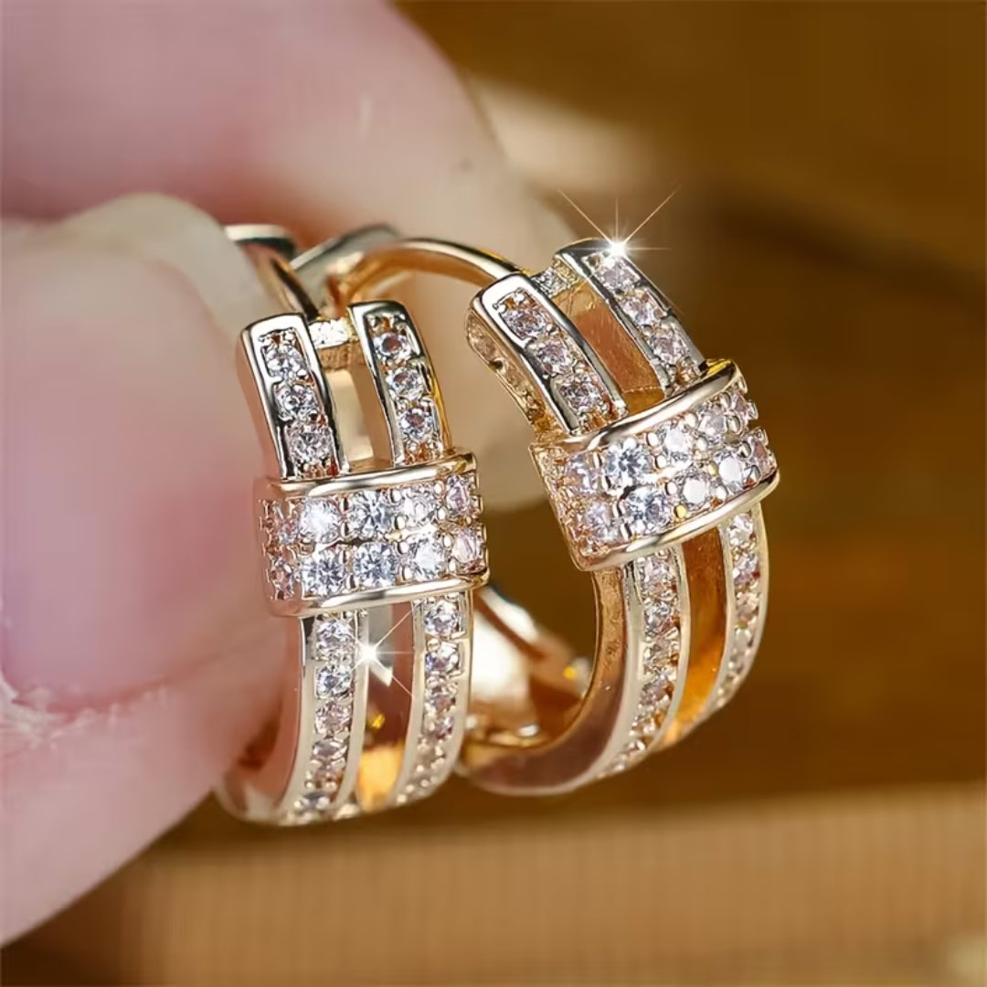 Gouden huggie oorbellen met pavé zirkonia