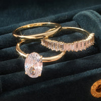 Gouden ring met ovale zirkonia en baguette band