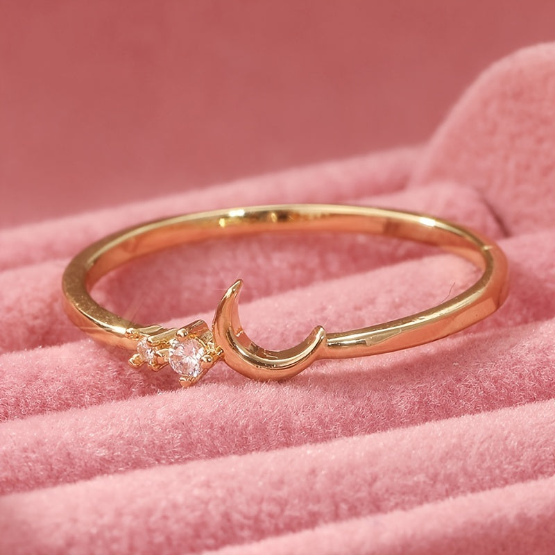 Gouden ringenset met zon, maan en sterren