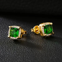 Gouden oorbellen met groene edelsteen en kristallen rand