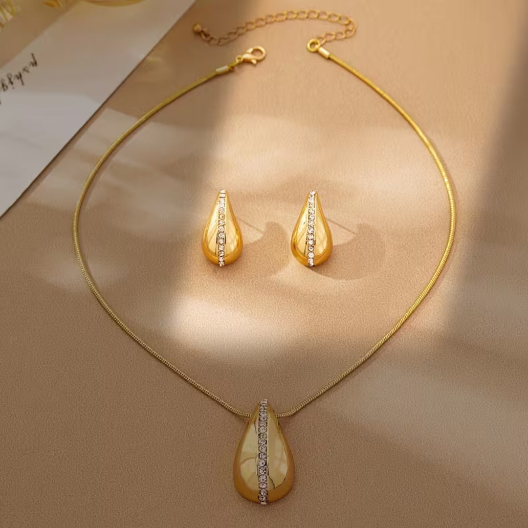 Gouden sieradenset met pavé druppelhanger en oorbellen