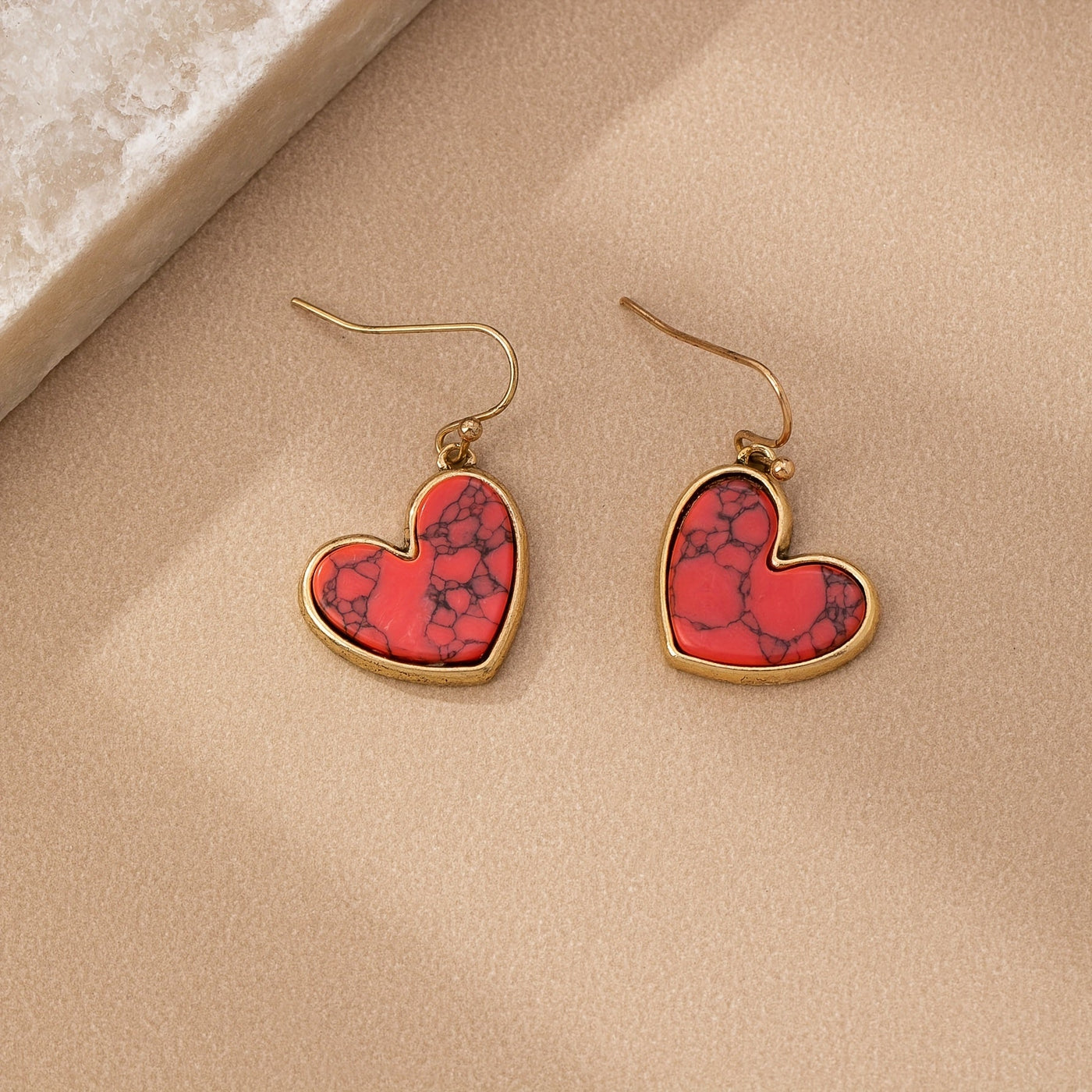 Gouden oorbellen met turquoise hart