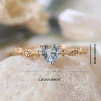 Roségouden ring met hartvormige aquamarijn