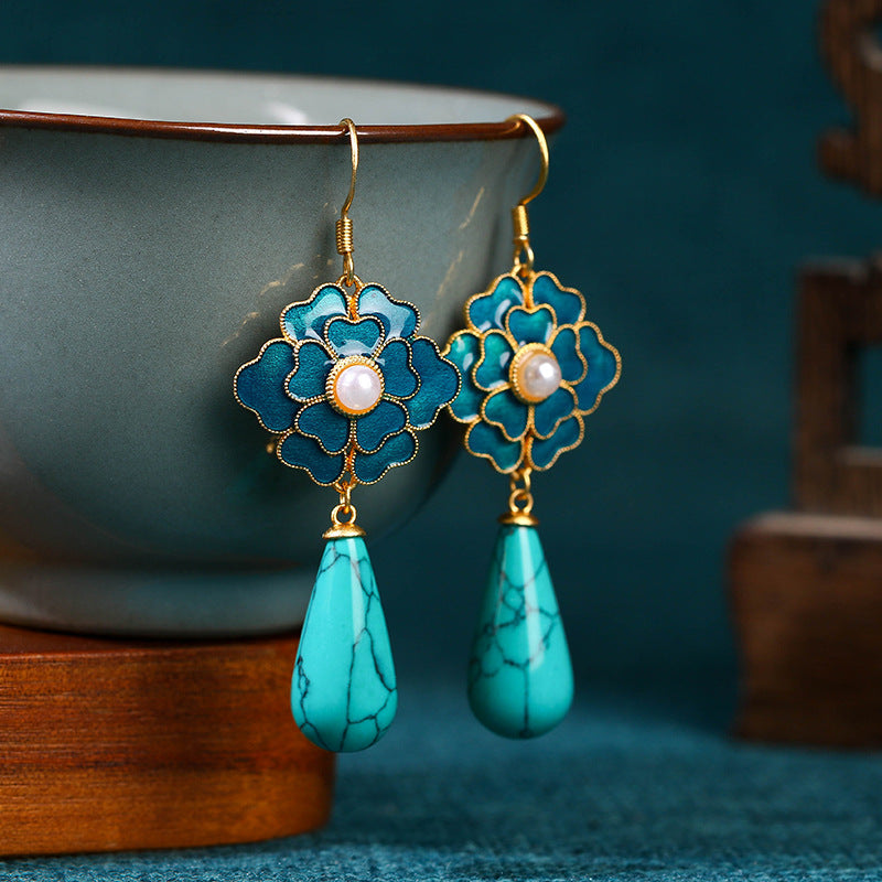 Vintage oorbellen met turquoise bloem en druppelhanger