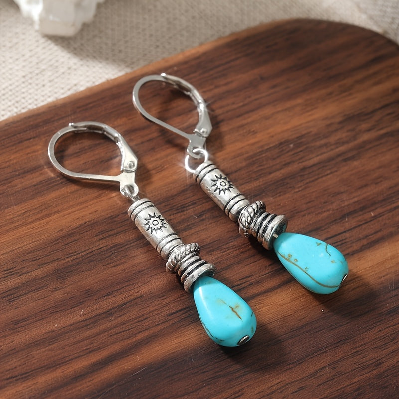 Zilveren etnische oorbellen met turquoise druppel