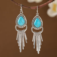 Zilveren bohemian oorbellen met turquoise en franjes