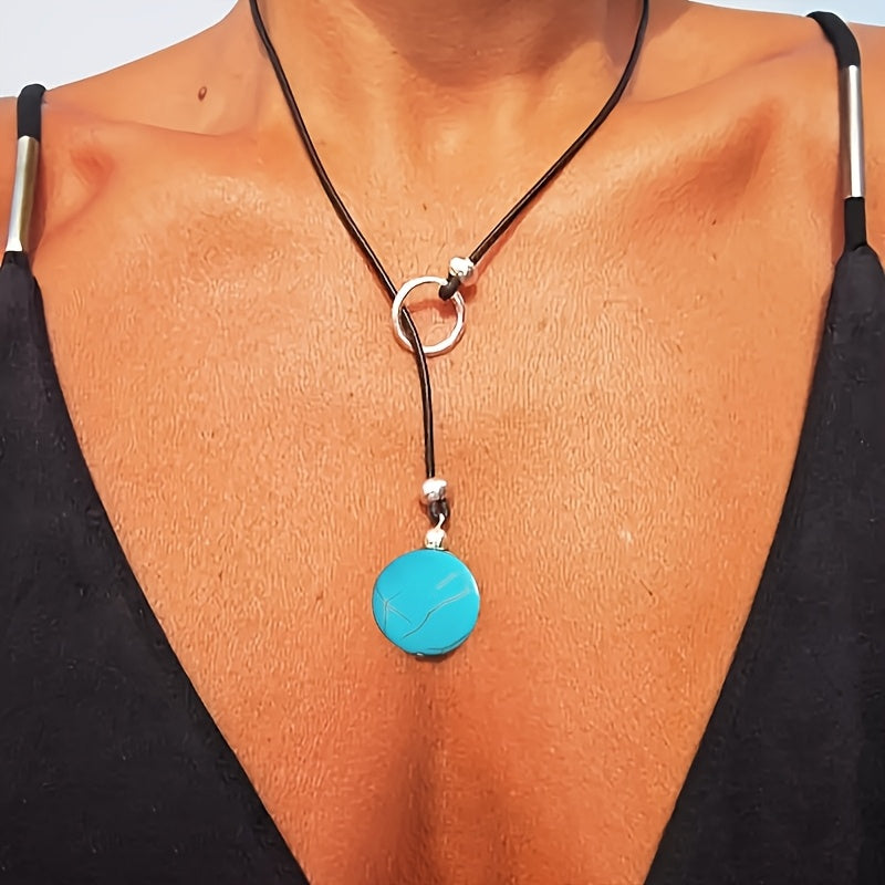 Minimalistische ketting met zilveren ring en turkooizen steen