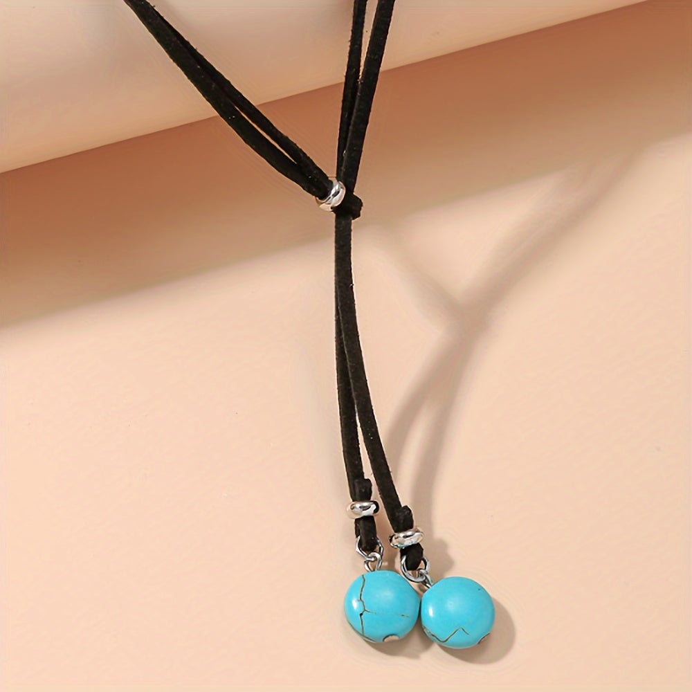 Bohemian lariat ketting van zwart koord met turkooizen kralen