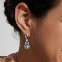 Zilveren vintage filigraan oorbellen met turquoise druppel