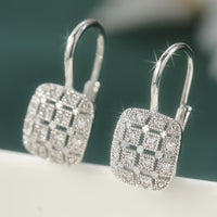 Zilveren vintage oorbellen met geometrisch open vlak en zirkonia