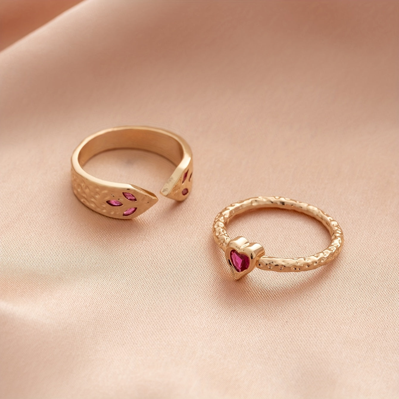 Gouden ringenset met slang en hart met roze zirkonia