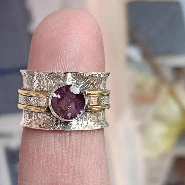 Zilveren spinner ring met amethist
