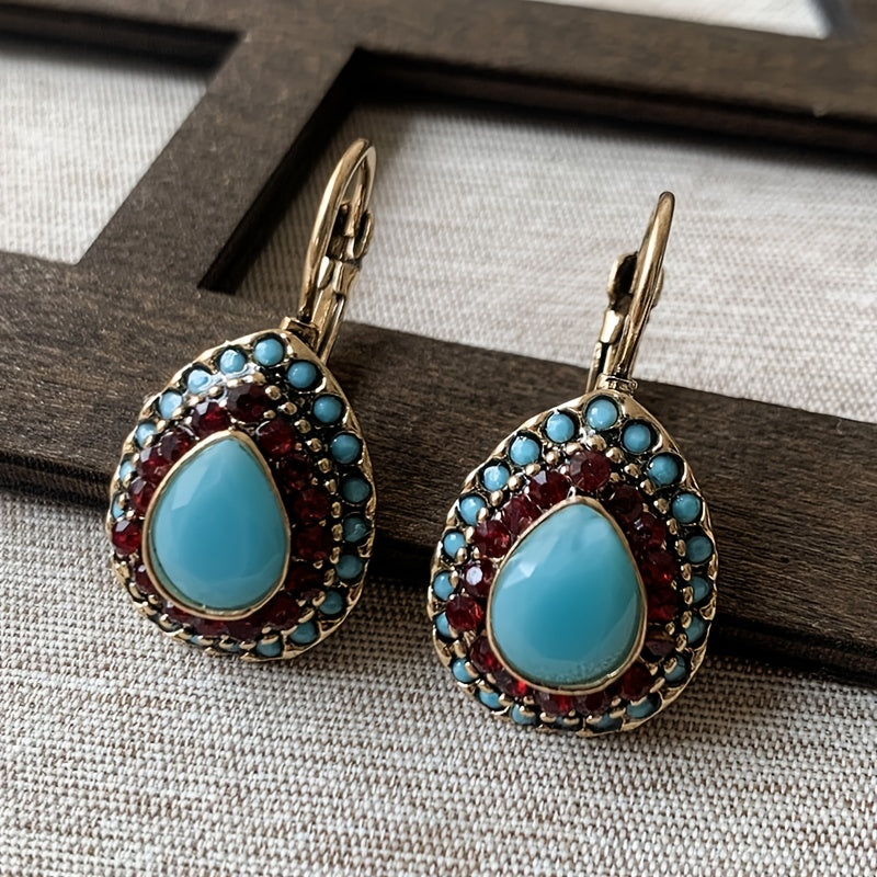 Bohemian bronzen oorbellen met turkoois en rode strass