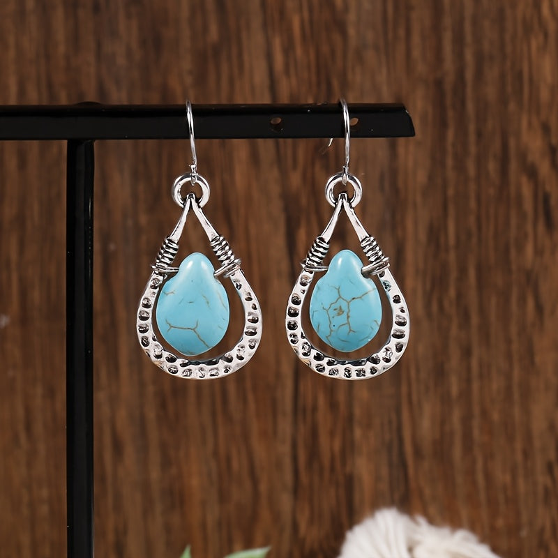 Zilveren oorbellen met wire-wrapped turquoise druppel