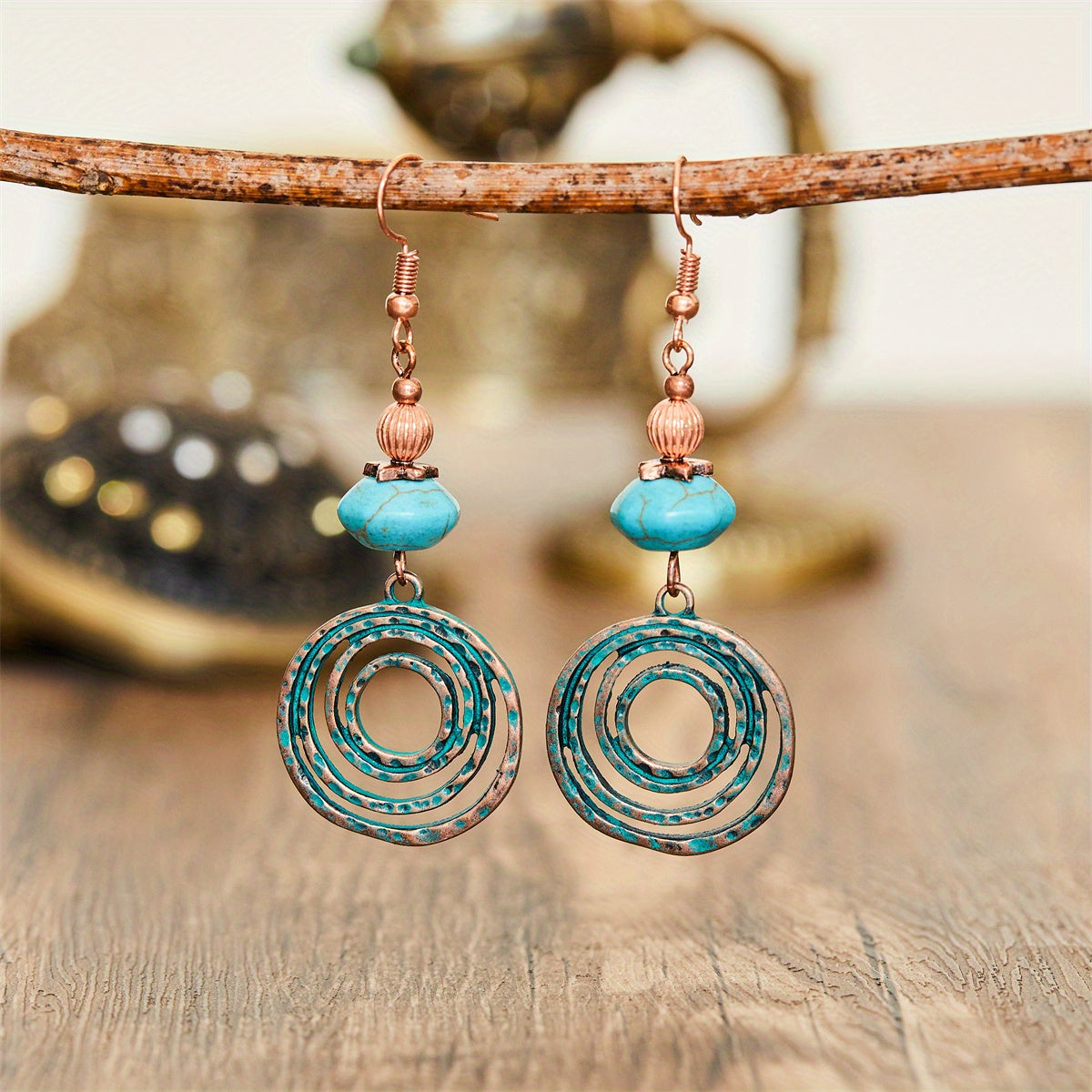 Bohemian oorbellen met roségoud spiraal en turquoise