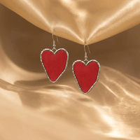 Zilveren oorbellen met rood hart