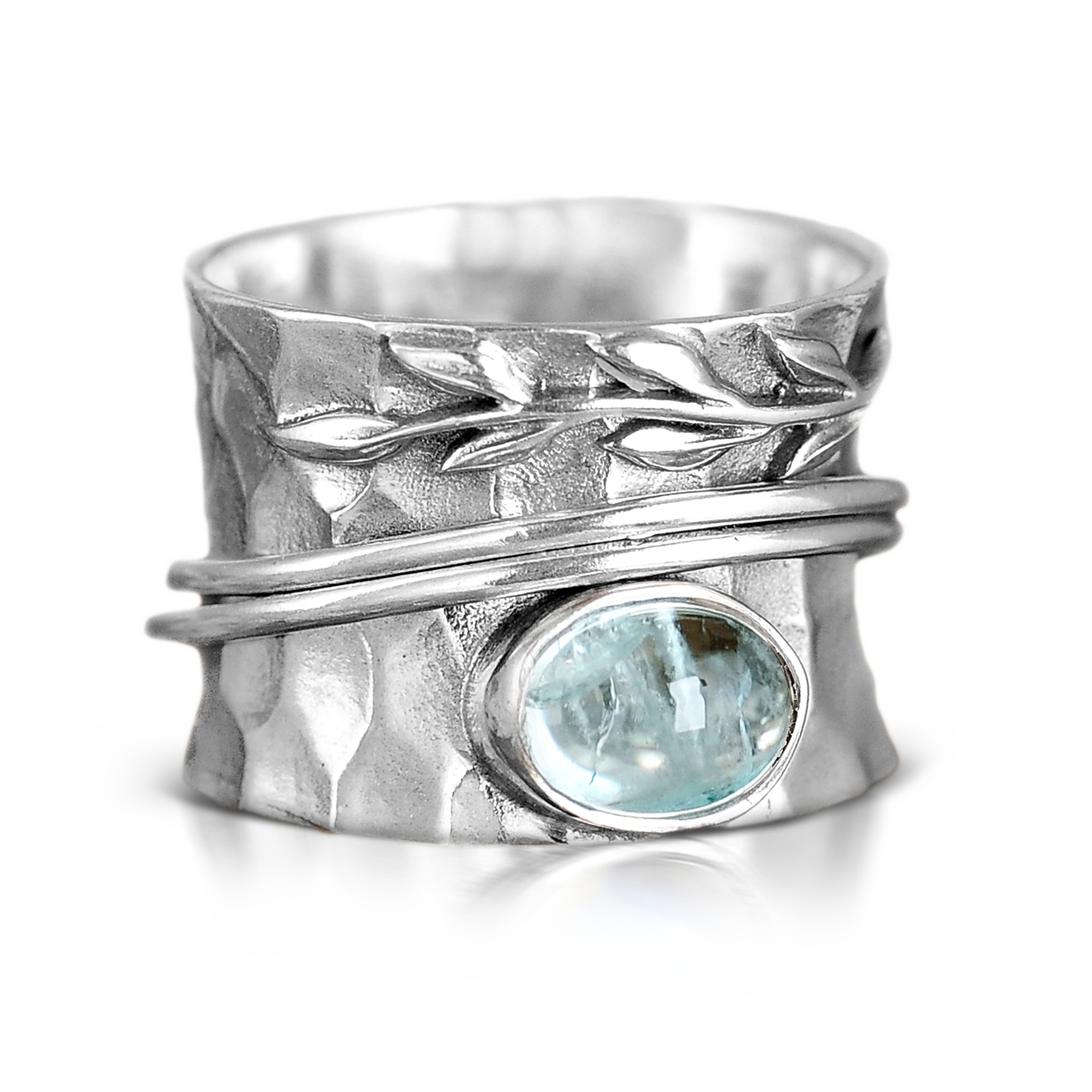 Zilveren spinner-ring met aquamarijn en bladmotief