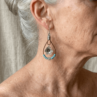 Zilveren bohemian oorbellen met turquoise druppels