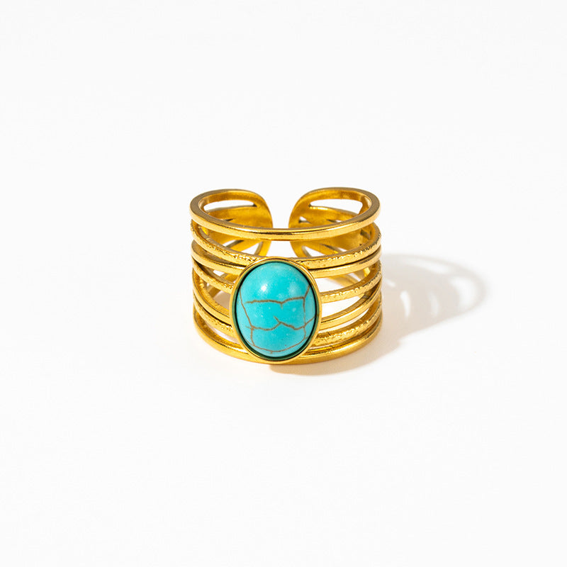 Gouden ring met ovale turquoise edelsteen