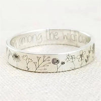 Zilveren ring met gegraveerde wilde bloemen