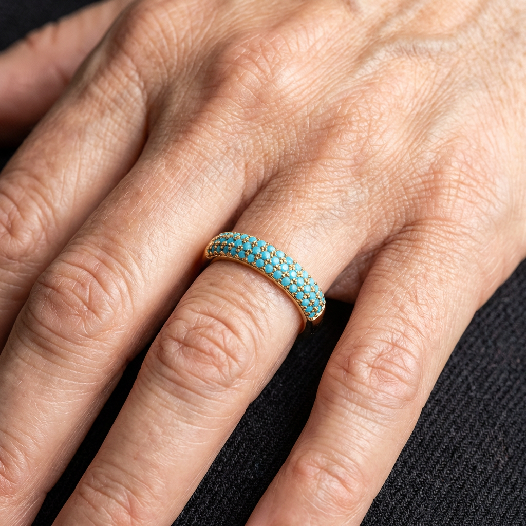 Gouden verstelbare ring met turquoise kralen