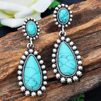 Western zilveren hangoorbellen met turquoise druppel
