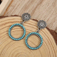 Zilveren vintage oorbellen met turquoise kralenring