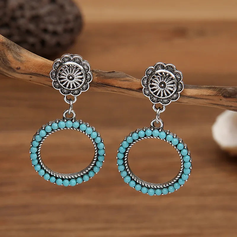 Zilveren vintage oorbellen met turquoise kralenring