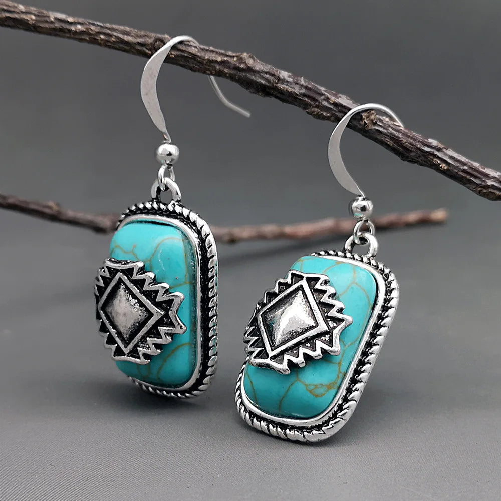 Bohemian zilveren oorbellen met turquoise en Azteeks motief