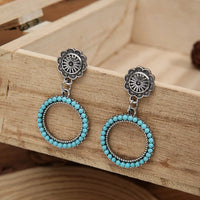 Zilveren vintage oorbellen met turquoise kralenring
