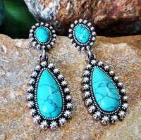 Western zilveren hangoorbellen met turquoise druppel